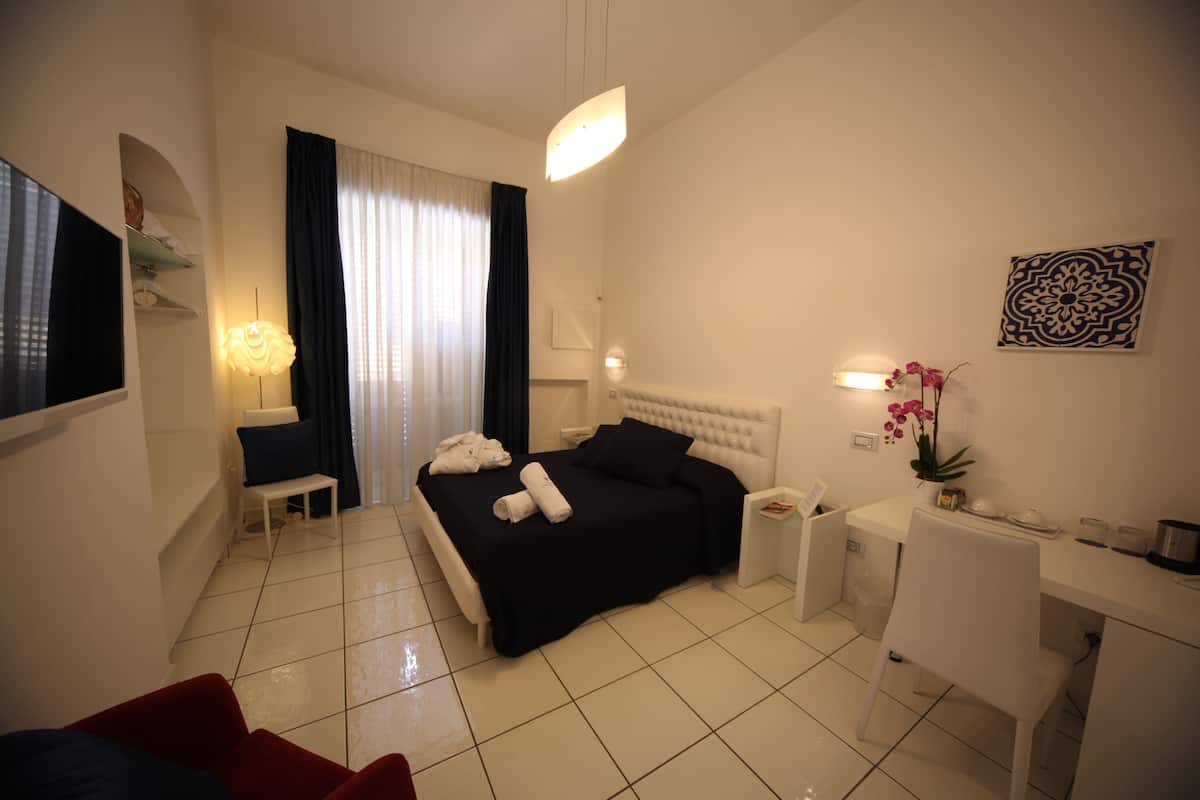 Ropa de cama de alta calidad y minibar