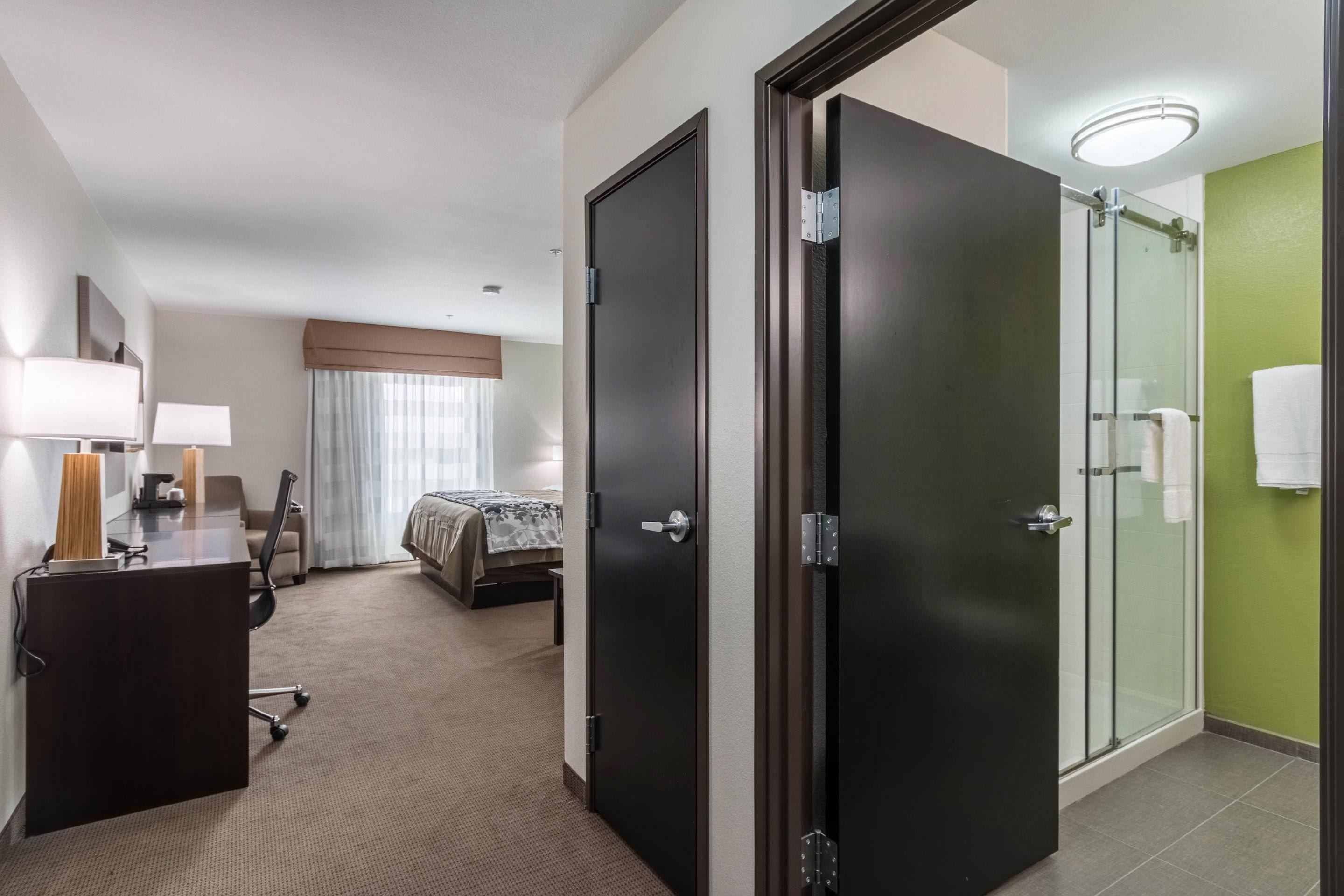 suite, 1 king bed, non smoking | pillow-top beds, desk, iron/ironing board, free wifi