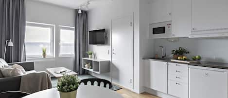 1 bedroom apartment for 3 | Oppholdsområde | En 40-tommers Flatskjerm-TV med kabel-kanaler samt TV