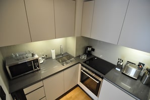 Huoneisto, 1 makuuhuone, kaupunkinäköala | 1 makuuhuone, silitysrauta/-lauta, ilmainen Wi-Fi