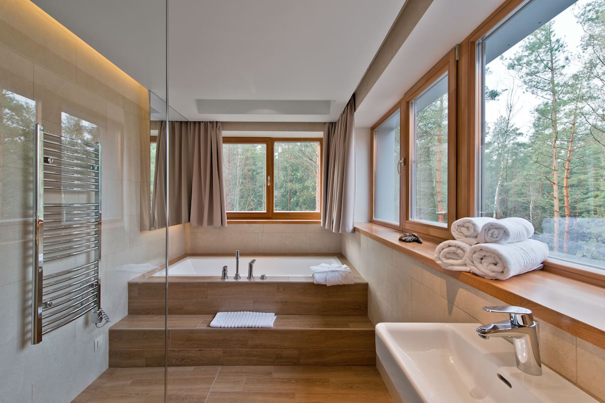 superior deluxe room (with spa access) | bathroom | shower, free toiletries, hair dryer, towels