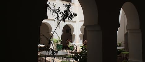 Breakfast, lunch, dinner served; Moroccan cuisine, al fresco dining