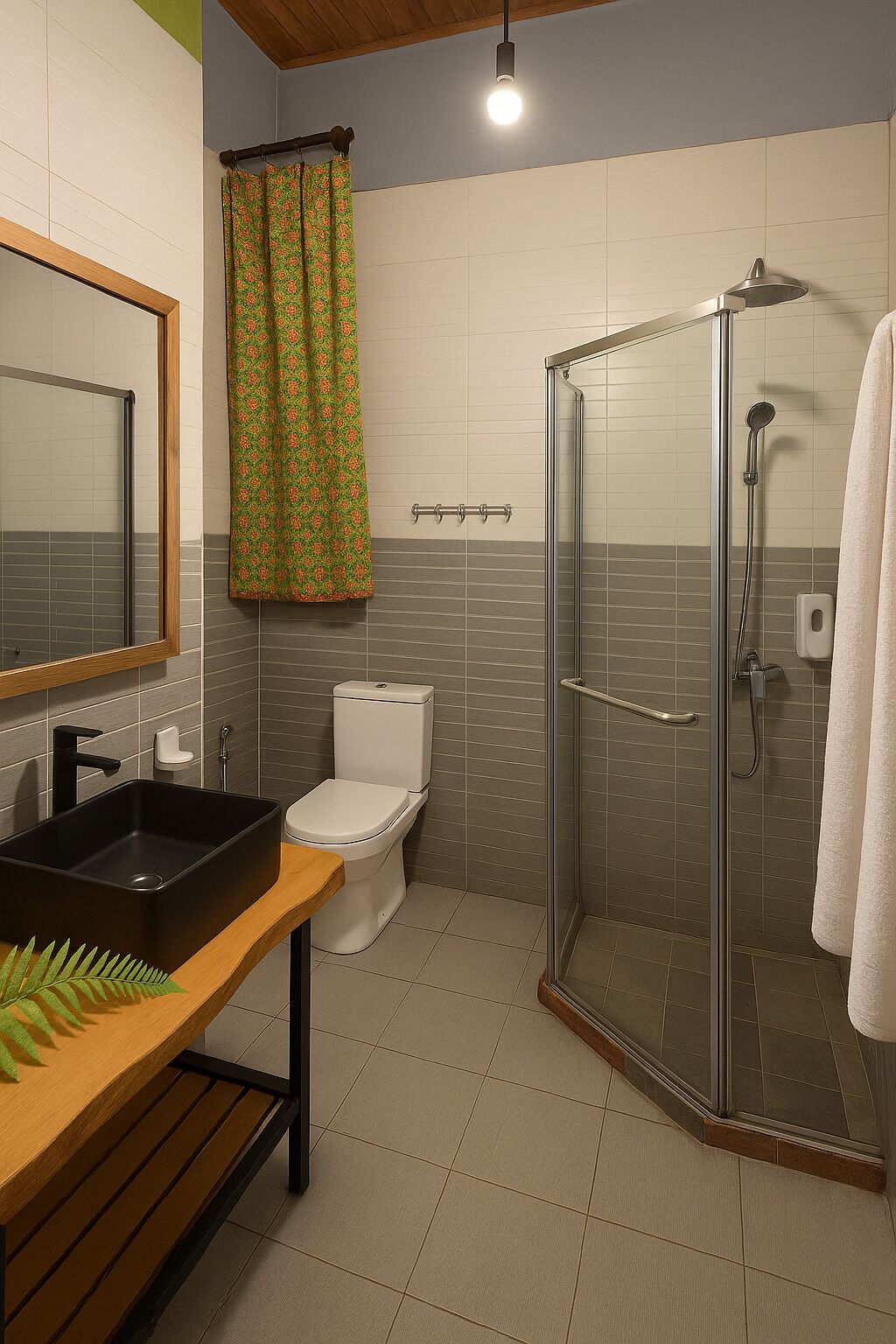 Een badkamer met een douchecabine, een toilet, een wastafel en een spiegel.
