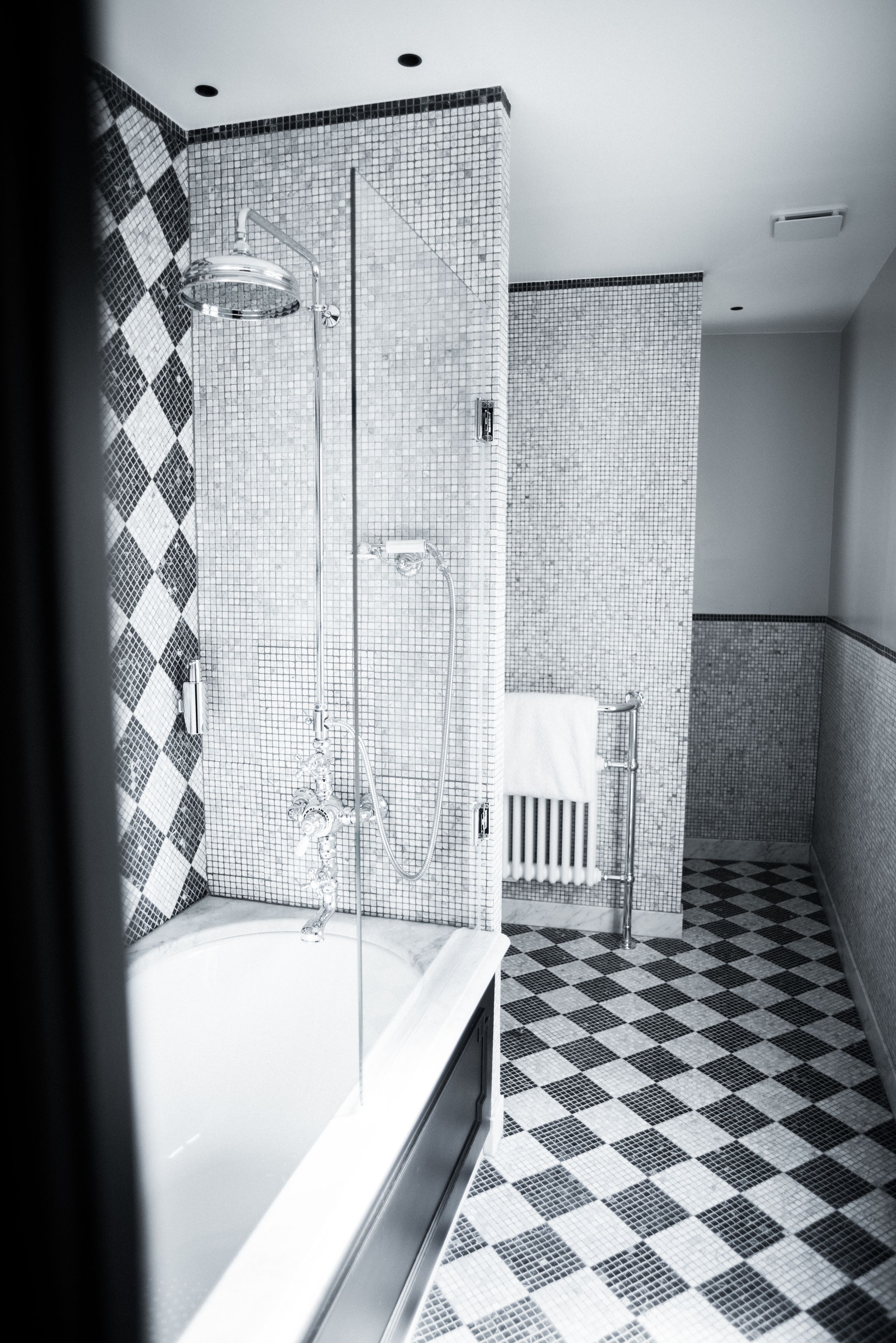 junior suite | bathroom | rainfall showerhead, free toiletries, hair dryer, bathrobes