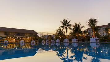 2 outdoor pools, open 5 AM to 8 PM, pool umbrellas, pool loungers