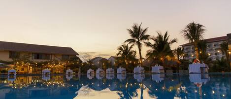 2 outdoor pools, open 5 AM to 8 PM, pool umbrellas, pool loungers