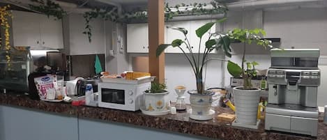 Mini-fridge, microwave, electric kettle, toaster