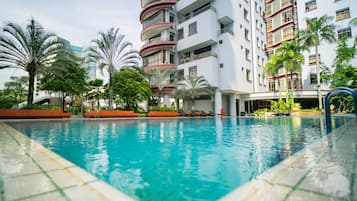 Outdoor pool, open 7:00 AM to 9:00 PM, pool loungers