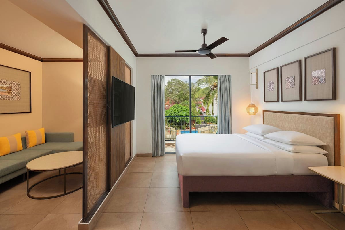 Suite estudio, 1 cama de matrimonio, no fumadores, vistas a la piscina | Ropa de cama de alta calidad, minibar, caja fuerte
