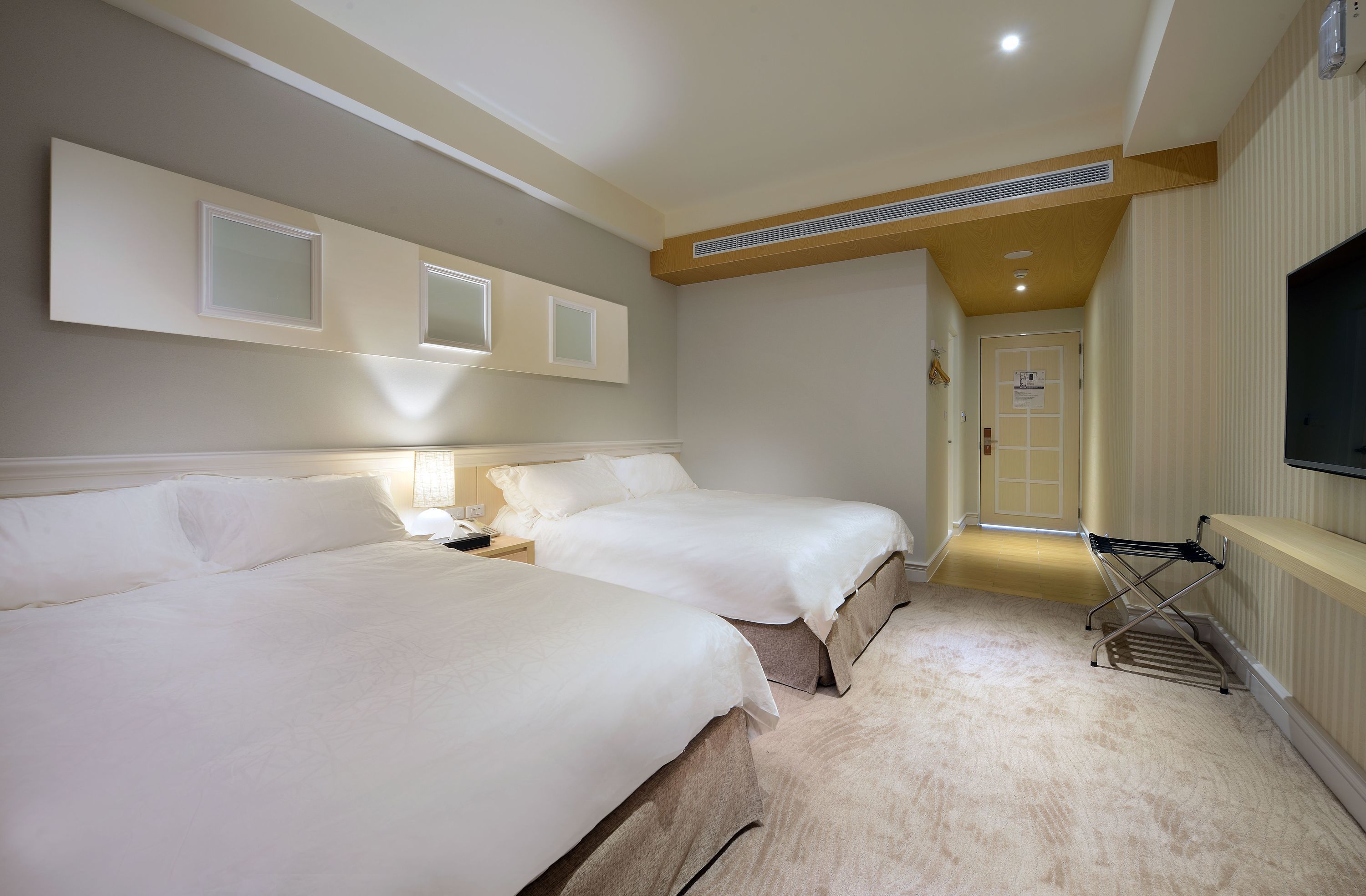 quadruple room | premium bedding, down duvets, desk, blackout curtains