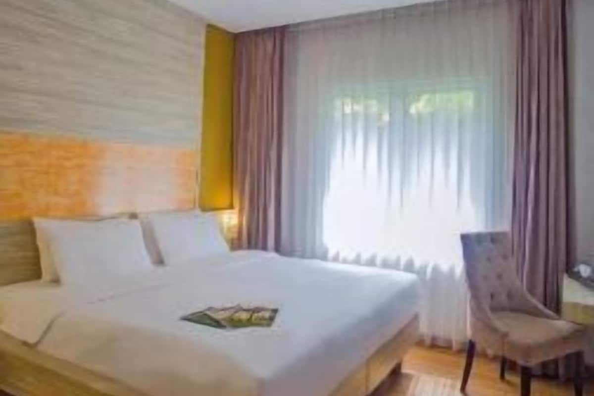 In-room safe, desk, blackout curtains, soundproofing