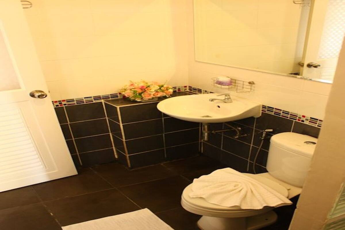 superior city view | bathroom | shower, towels