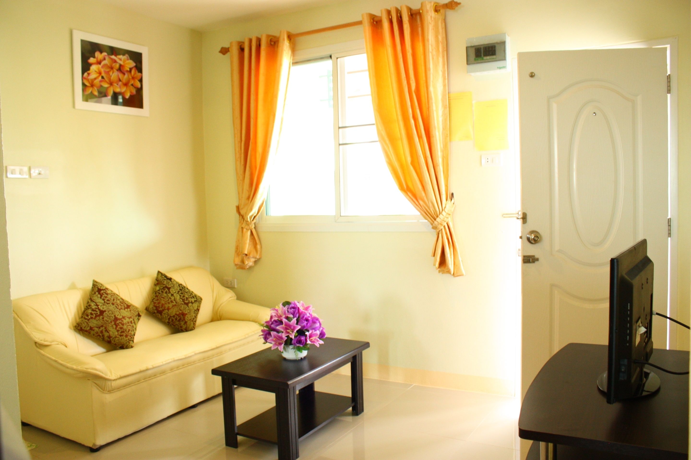 suite city view | living area | lcd tv