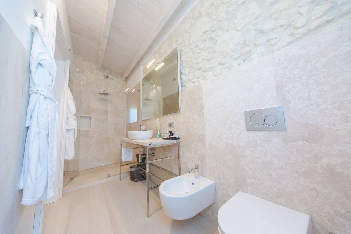 luxury room, jetted tub (garden) | bathroom | free toiletries, hair dryer, slippers, bidet