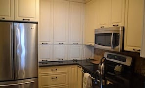 Luxury Apartment, 2 Bedrooms, Non Smoking, Beach View | Private kitchen | Fridge, microwave, coffee/tea maker