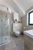 Shower, free toiletries, hair dryer, towels