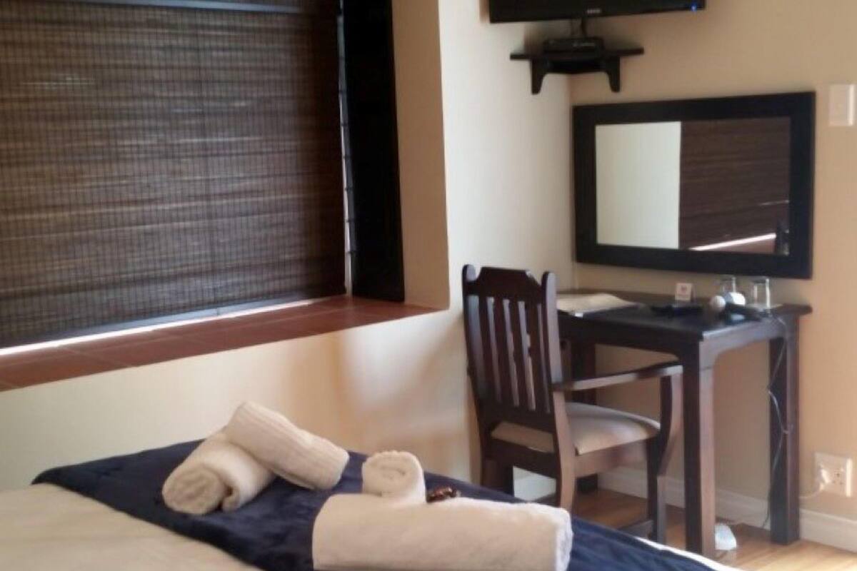 Quarto superluxo, 1 quarto | Cortinas blackout, ferros/tábuas de passar roupa, Wi-Fi de cortesia