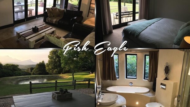 A hotel room with a large window, a sofa, a bed, a dining table, and a bathroom with a bathtub and sink. - Clairewood (Wilderness)