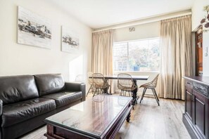 Family Apartment, Multiple Beds | Living area - Avemore Vredehof No 1- with backup power (Stellenbosch)