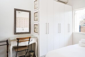 Family Apartment, Multiple Beds | 2 bedrooms, premium bedding, down comforters, pillowtop beds