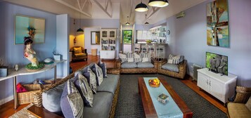 Deluxe Cottage (River Cottage ) | Living area | LCD TV