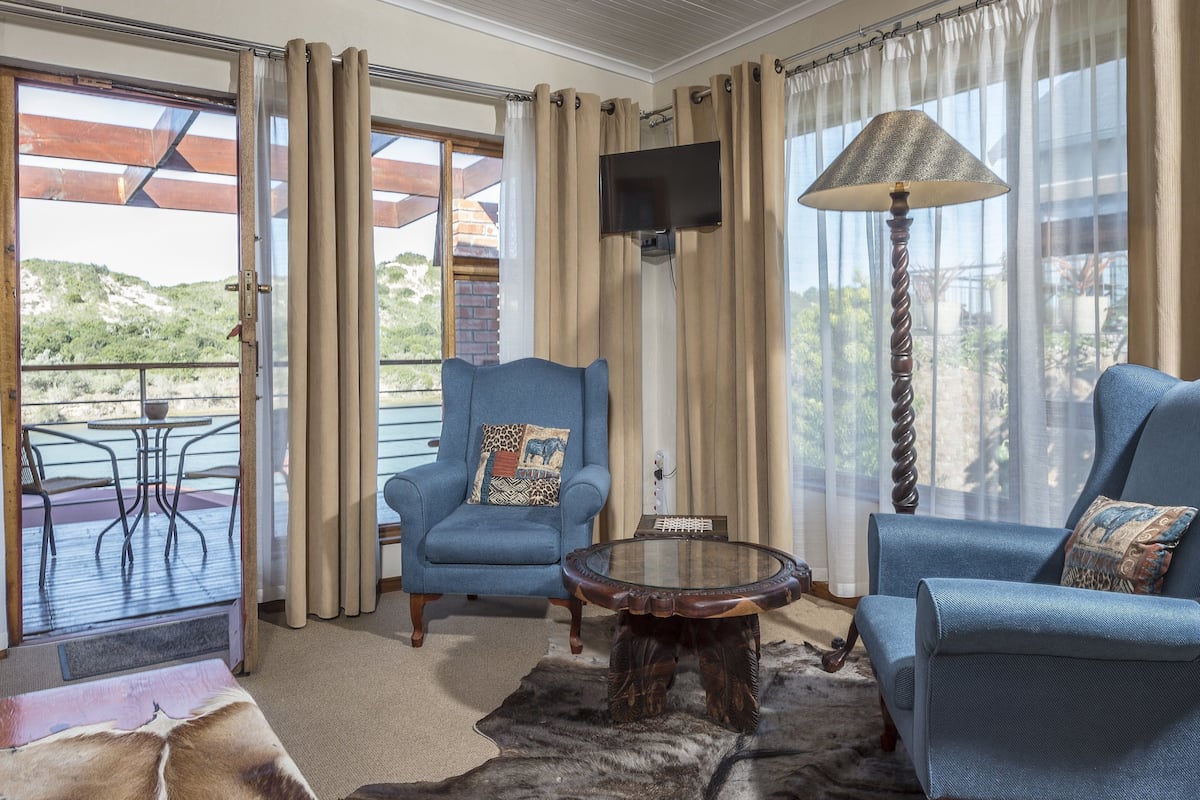Superior suite, 1 slaapkamer (Afrika Suite ) | Een minibar, een kluis op de kamer, individueel gedecoreerd