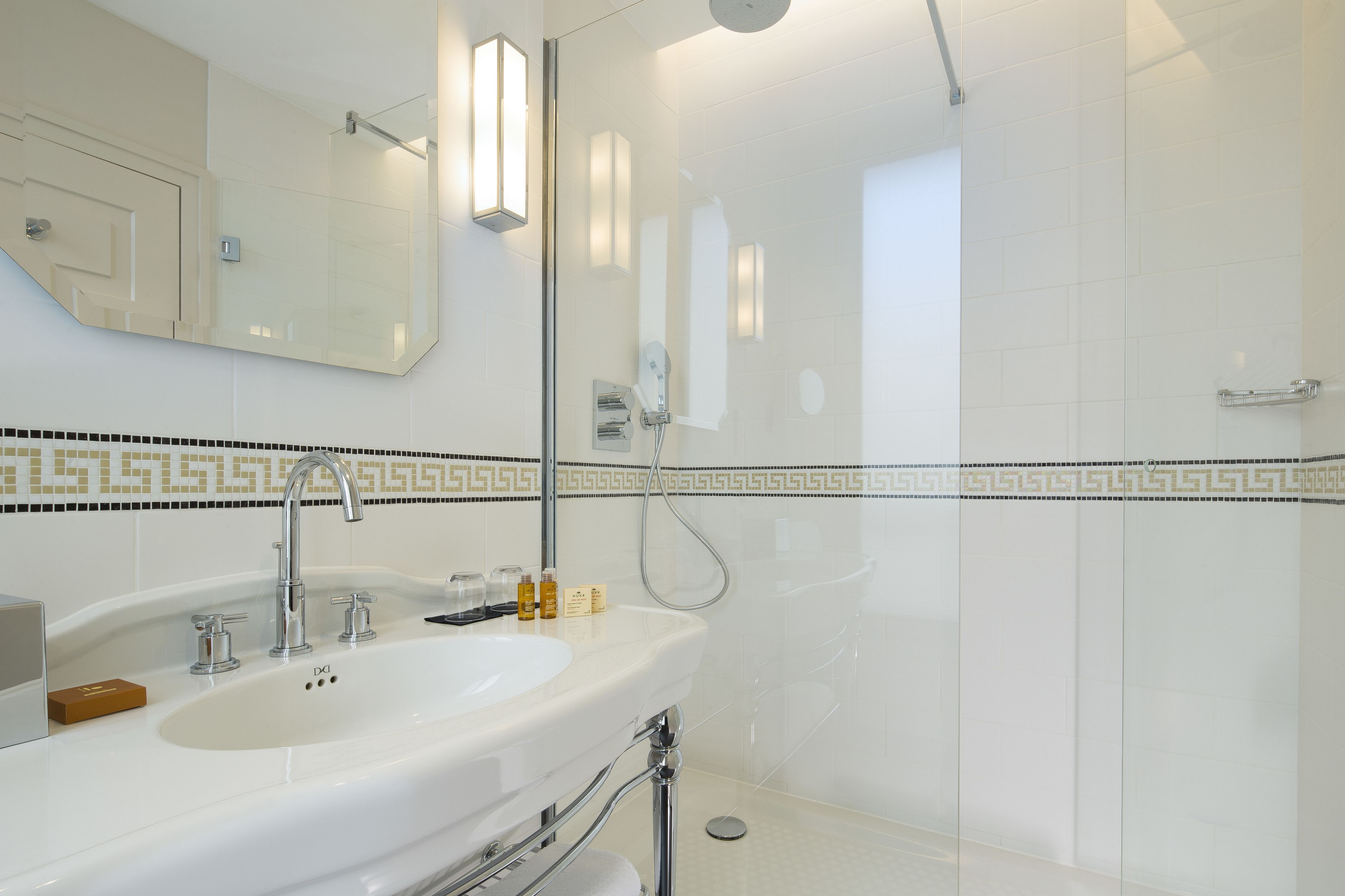 junior suite | bathroom | rainfall showerhead, free toiletries, hair dryer, bathrobes