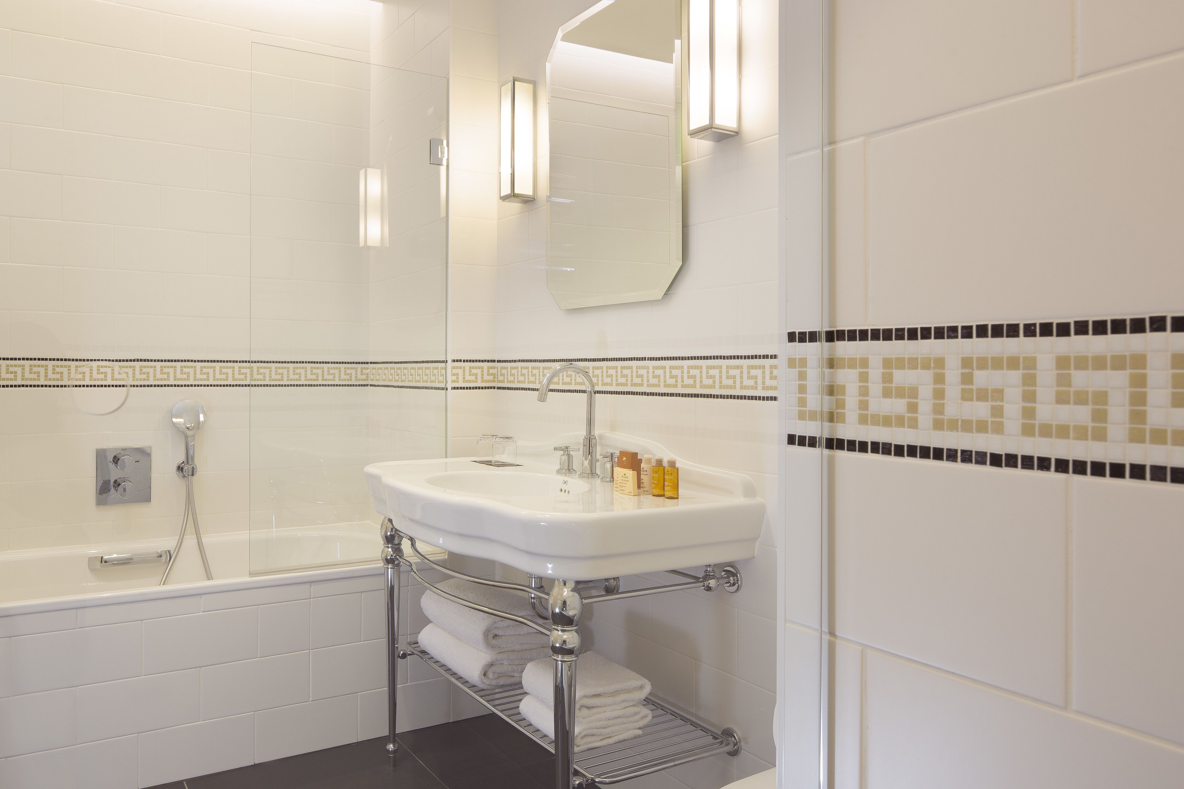 superior room | bathroom | rainfall showerhead, free toiletries, hair dryer, bathrobes
