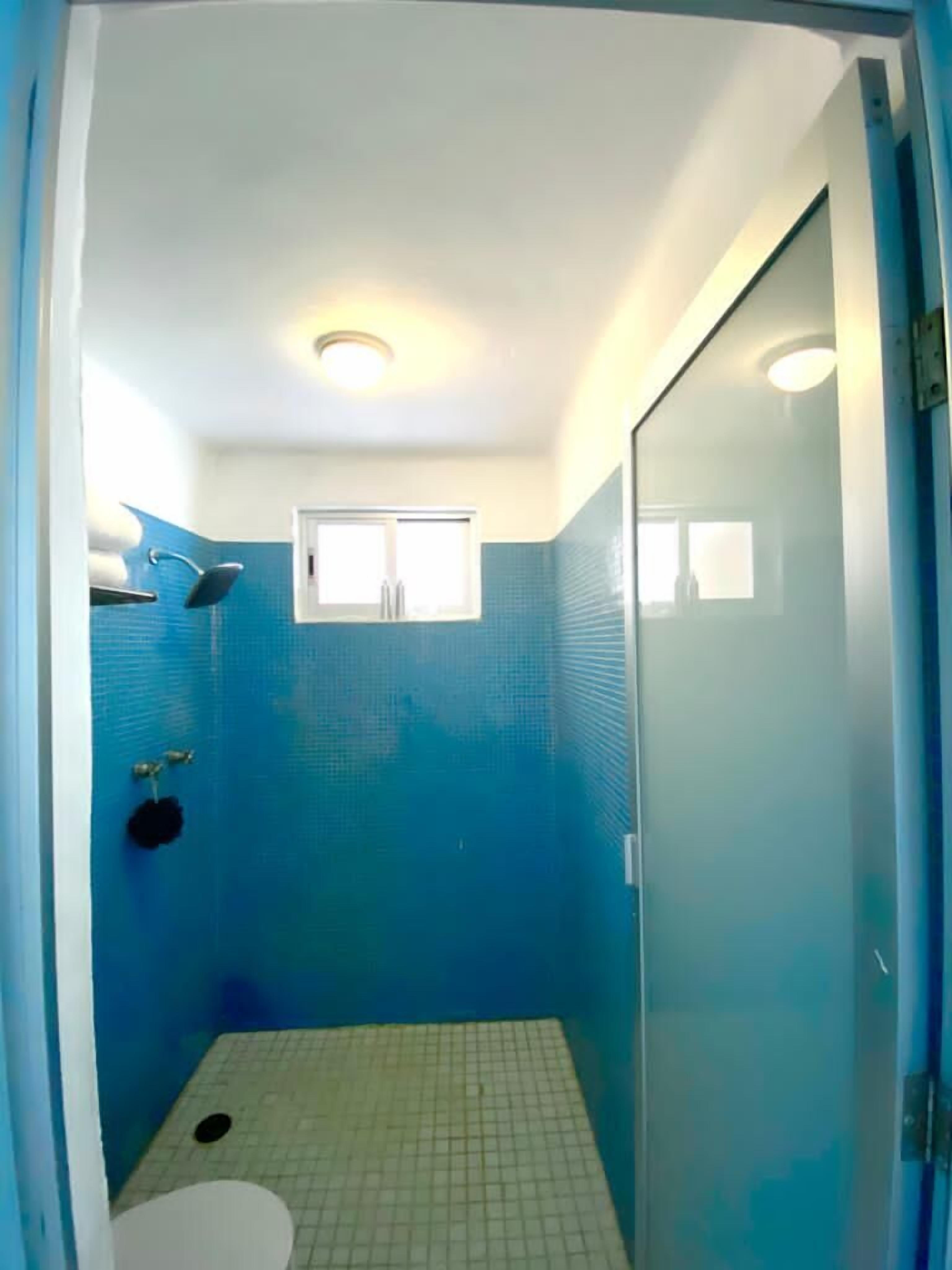 1 king bed room - deposit by paypal required | bathroom | shower, designer toiletries, towels