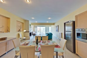 Deluxe Apartment, 3 Bedrooms, Sea View | Private kitchen | Full-size fridge, stovetop, cookware/dishes/utensils