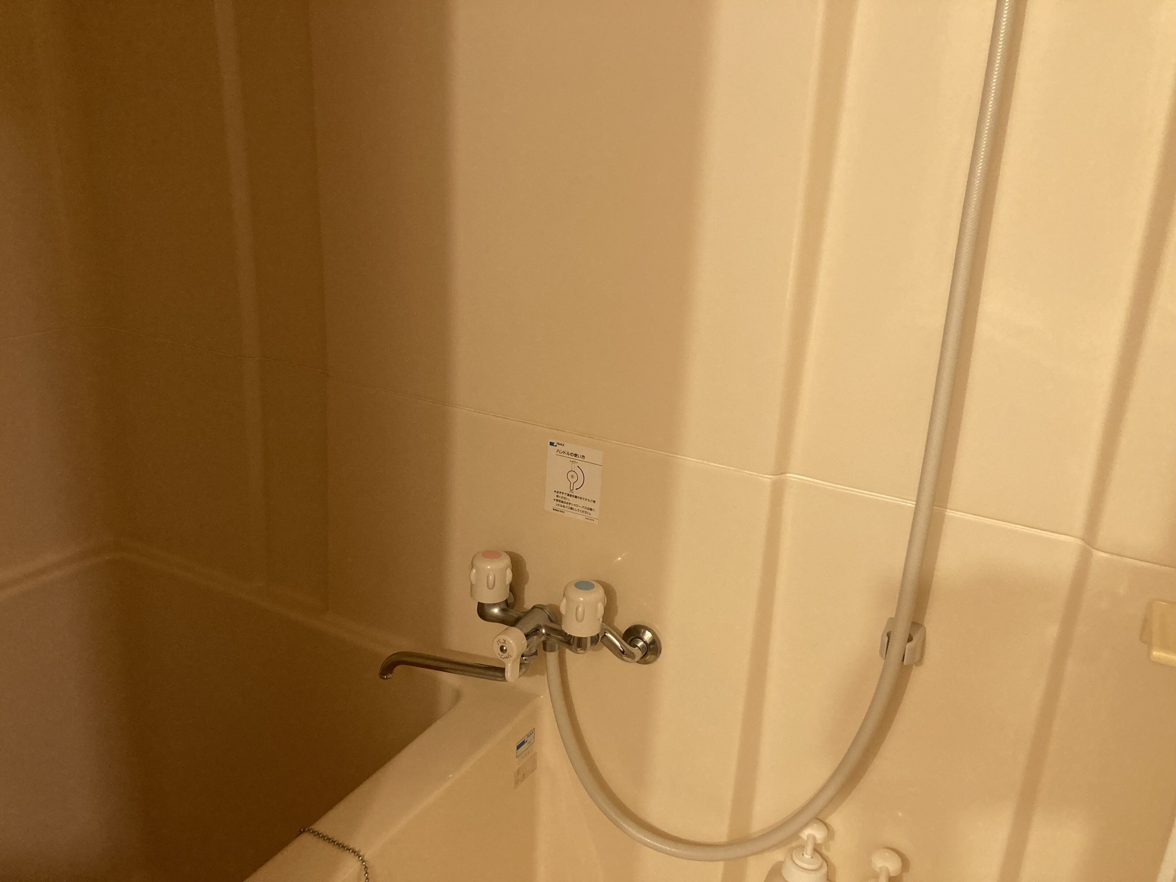 A bathroom with a bathtub, a shower, and a toilet.