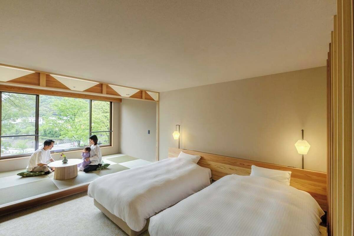 Design Twin kamer, niet-roken, uitzicht op bergen | 1 slaapkamer, een kluis op de kamer, een strijkplank/strijkijzer