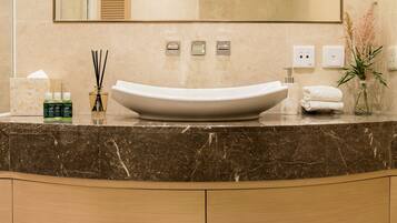 Burlington Suite | Bathroom | Shower, hair dryer, slippers, towels