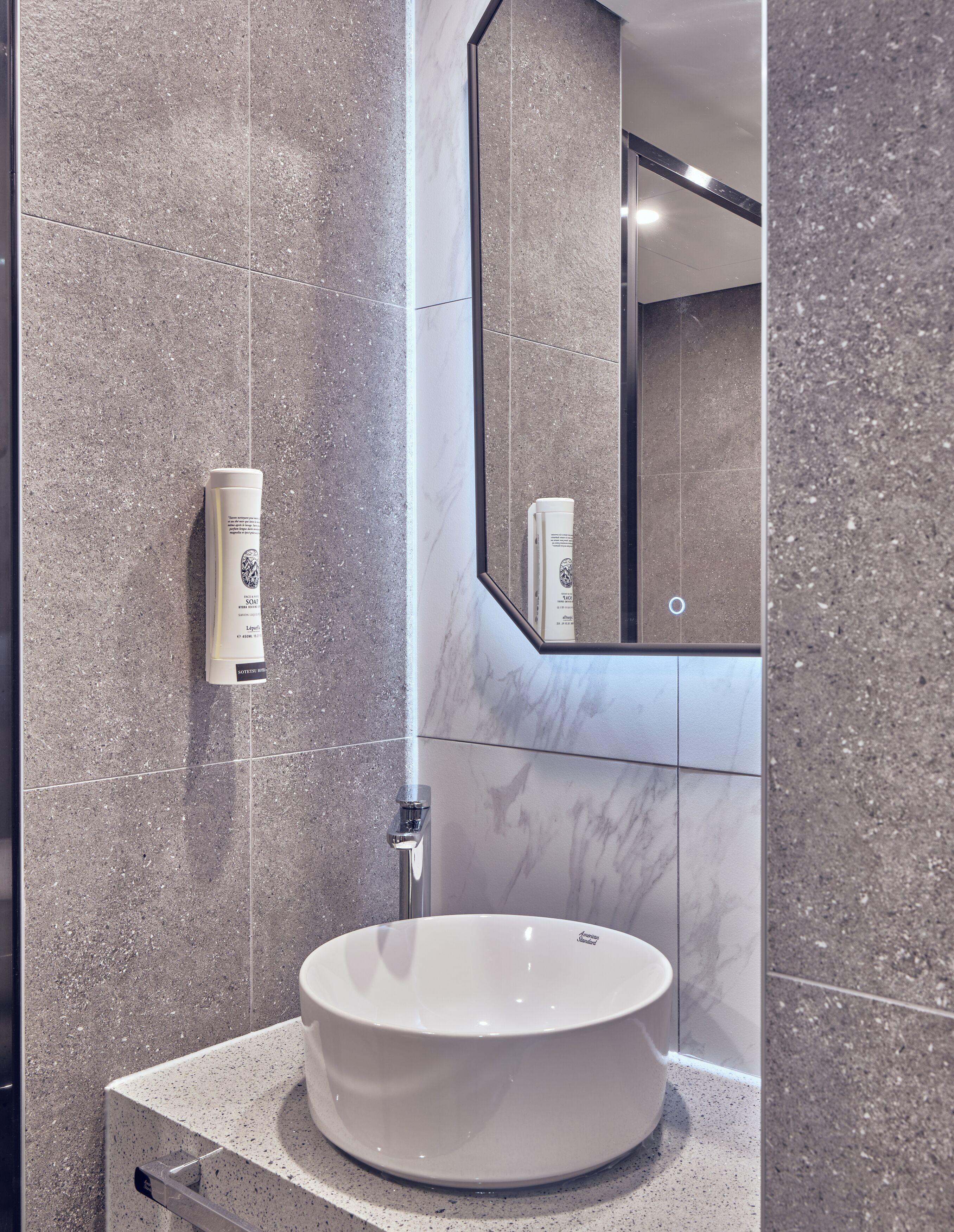 hair dryer, slippers, bidet, towels