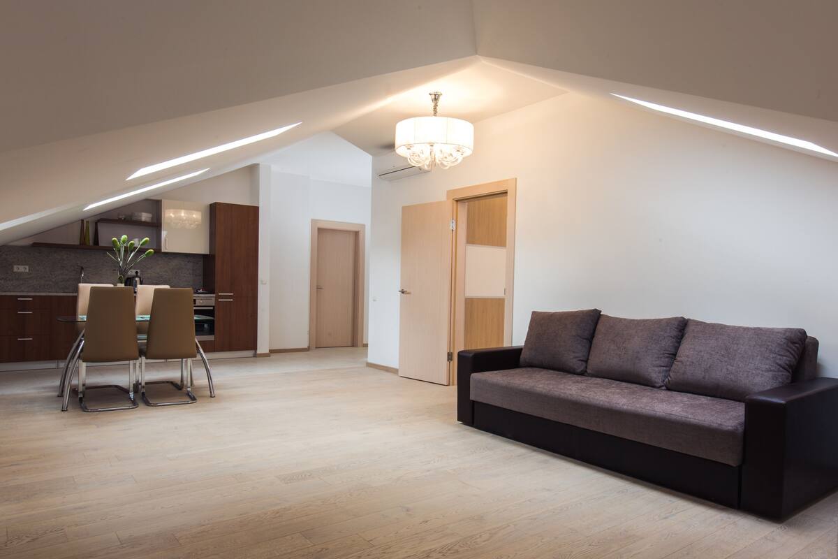 Departamento, 3 habitaciones | Área de sala de estar | Televisión de pantalla plana