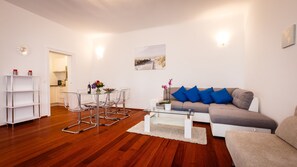 Premium Apartment, 1 Bedroom, Accessible, Balcony | Living area | Flat-screen TV