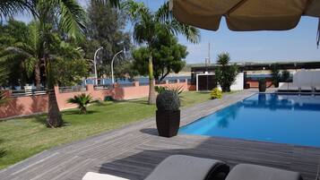 Outdoor pool, sun loungers