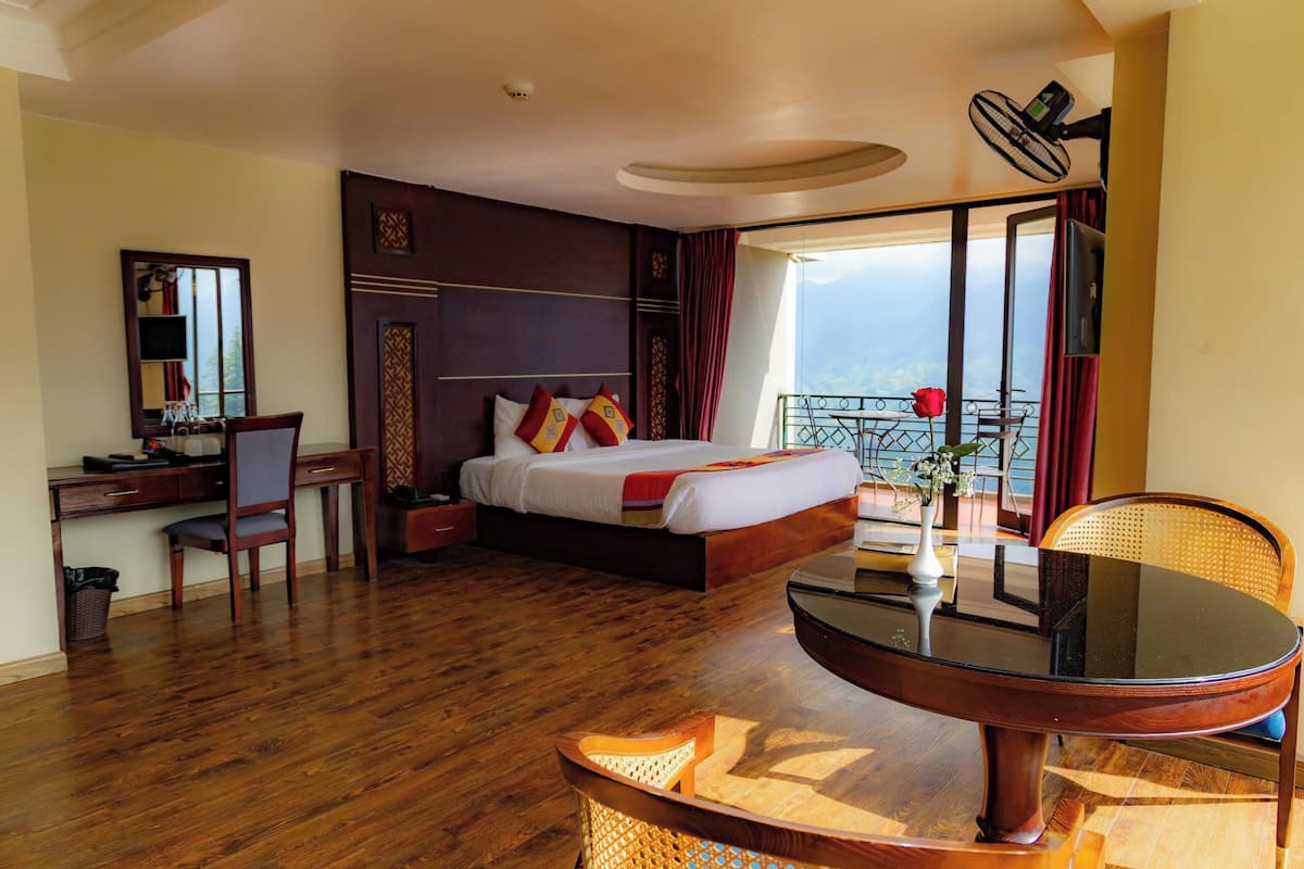 Phòng Suite Junior | Minibar, két bảo mật tại phòng, bàn, phòng cách âm