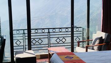 Family Triple Room, Balcony, Valley View | Minibar, in-room safe, desk, soundproofing