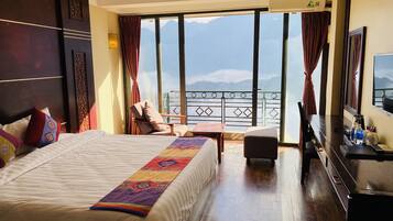 Deluxe Double or Twin Room | Minibar, in-room safe, desk, soundproofing