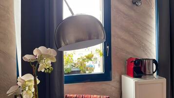 Habitación doble ejecutiva | Edredón, camas con efecto memoria y tabla de planchar con plancha