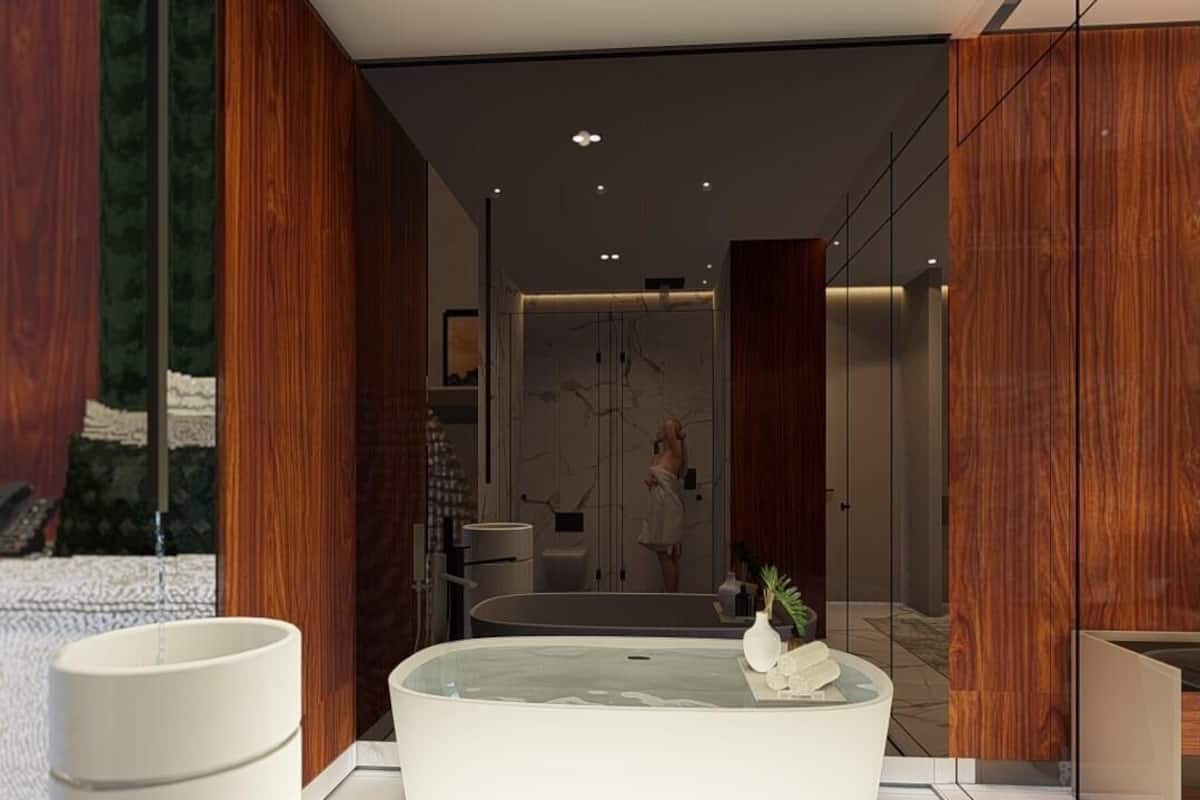 A modern bathroom with a freestanding bathtub, a large mirror, and wooden paneling.