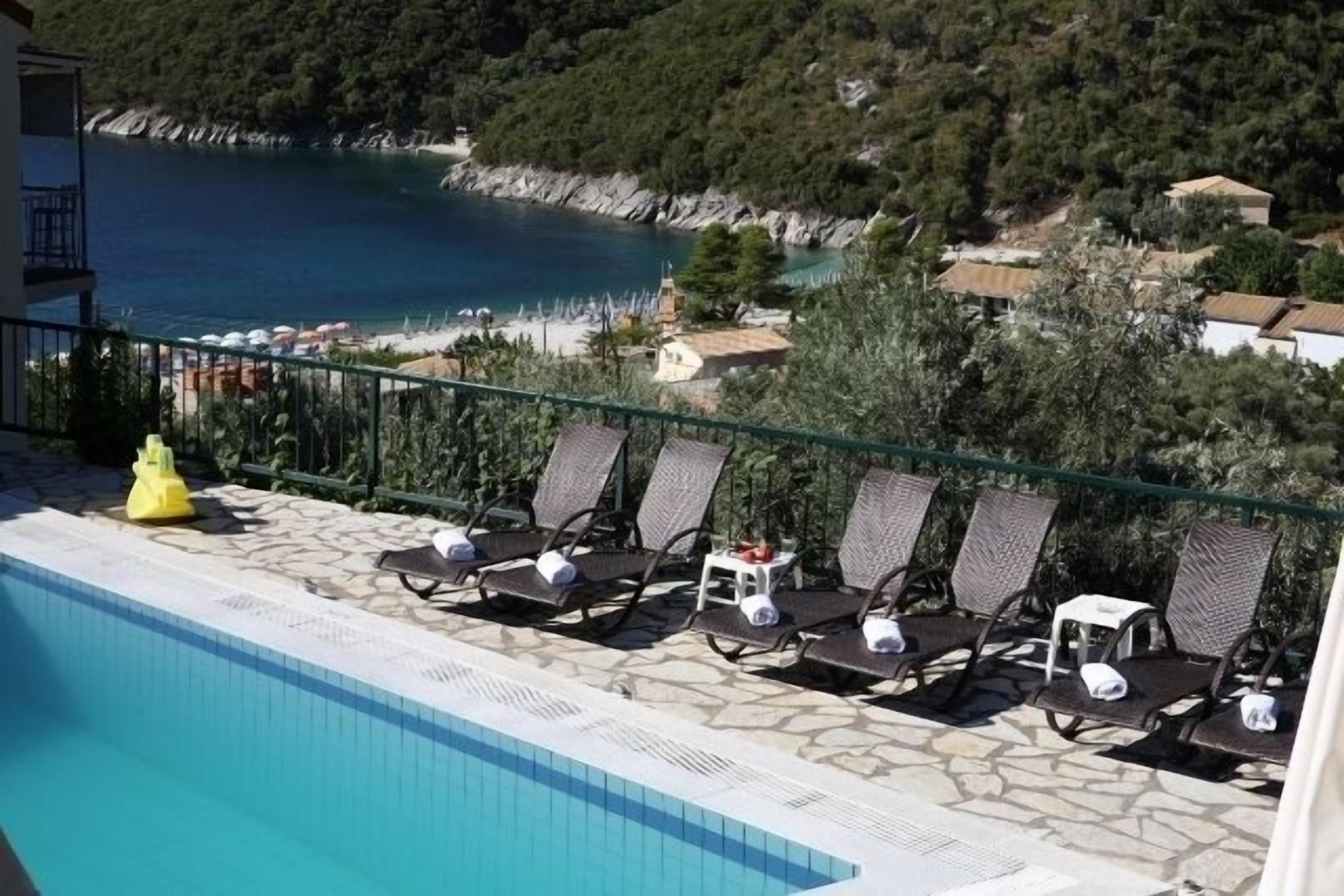 Seasonal outdoor pool, pool umbrellas, pool loungers