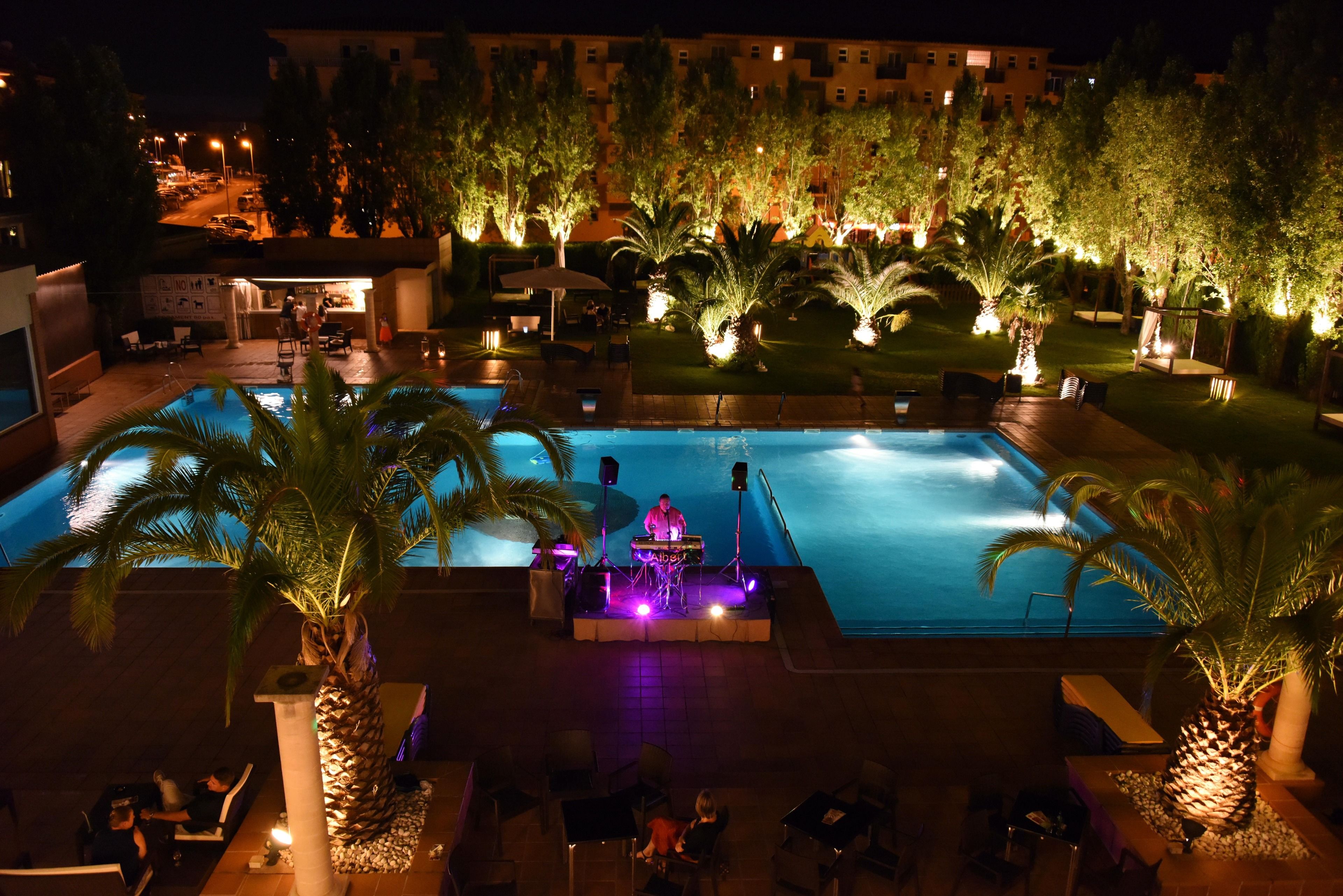 indoor pool, seasonal outdoor pool, pool umbrellas, pool loungers