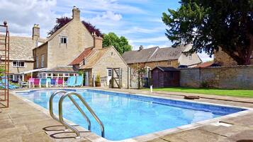 Seasonal outdoor pool, open 7:00 AM to 9:00 AM, sun loungers