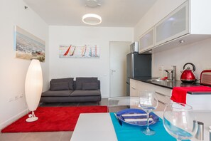 Executive Suite, 1 Bedroom, Sea View | Living area