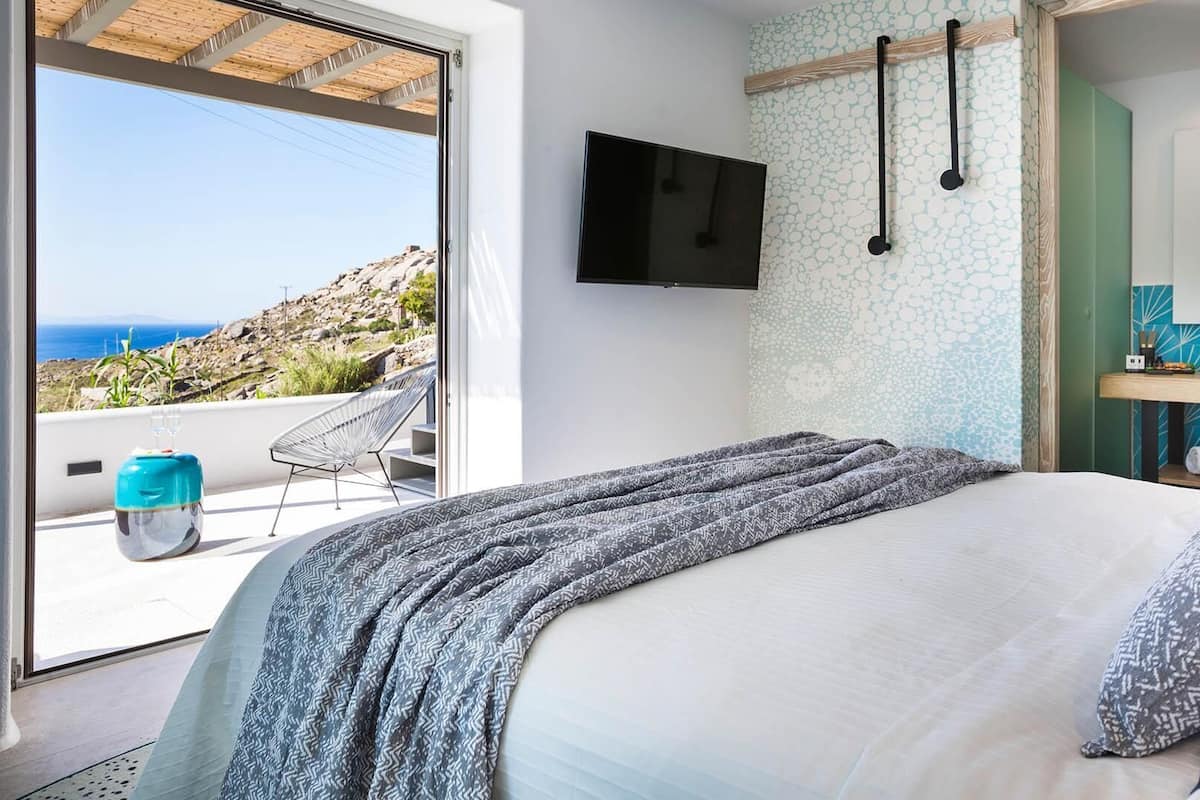 Aegean Honeymoon Suite with Jetted Tub | 1 bedroom, premium bedding, minibar, in-room safe