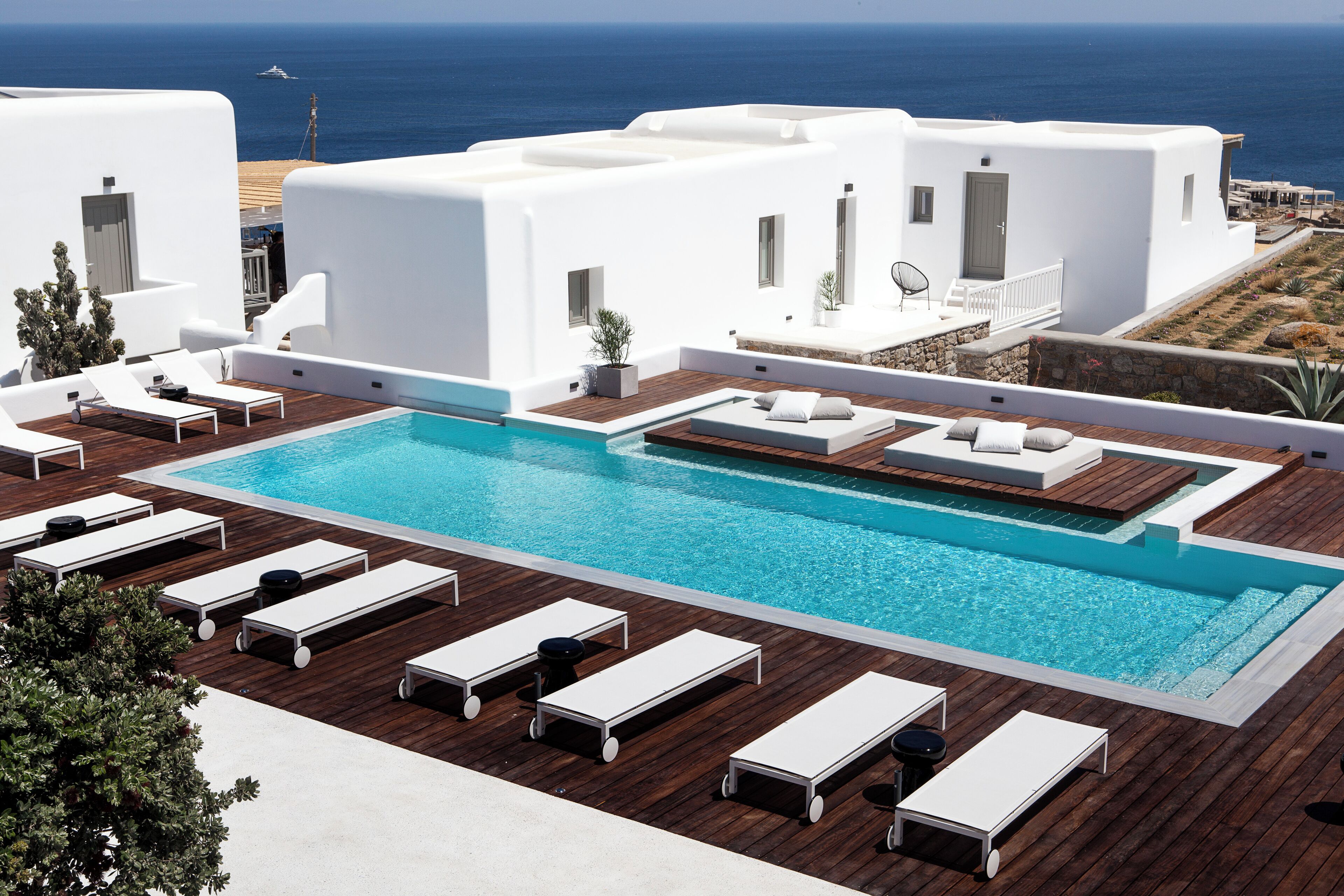 Seasonal outdoor pool, open 8:30 AM to 8:00 PM, pool umbrellas
