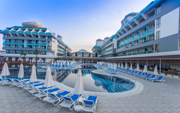 Indoor pool, 2 outdoor pools, open 6:00 AM to 7:30 PM, pool umbrellas