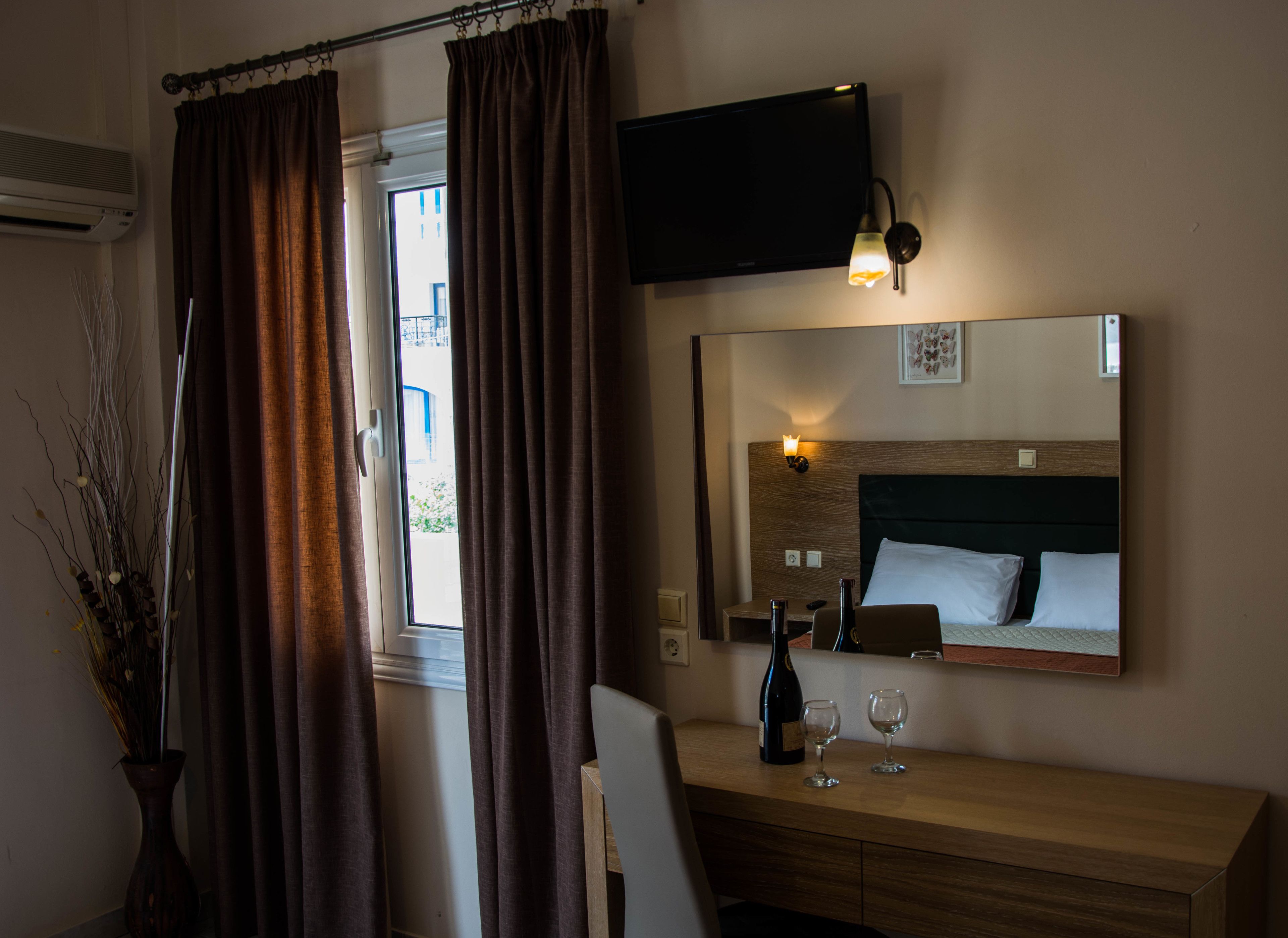 deluxe quadruple room | 1 bedroom, premium bedding, in-room safe, iron/ironing board